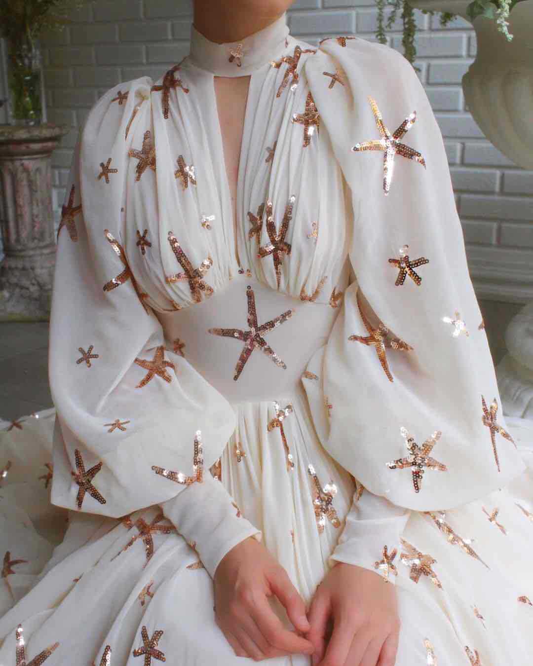 white dress with gold starfish Long Sleeve Flowing Starfish Dress with Mock Neck